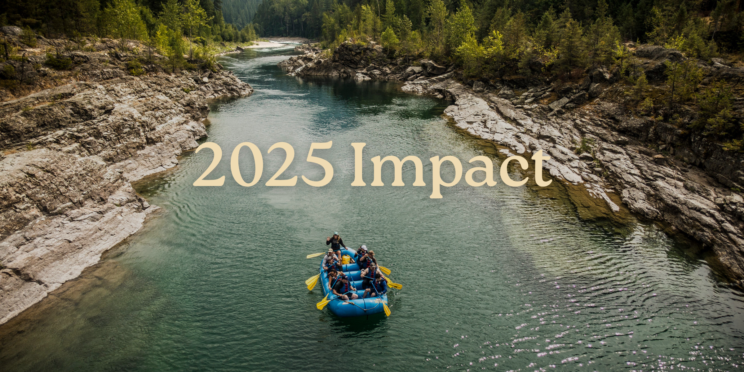 People is a rafting boat on a blue green river